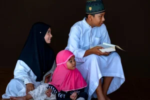 children reading holy book